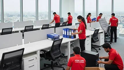 Office movers unpacking desks and computers in Aslali