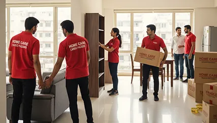 Movers unloading large furniture and fragile boxes during household relocation in Dariapur, Ahmedabad