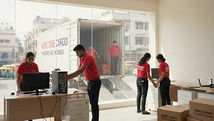 Office movers organizing desks and setting up a new workspace in Dhalka, Ahmedabad