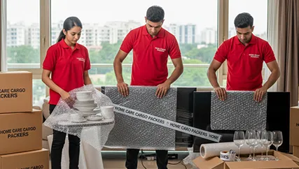 Movers unloading items from the truck into a new home