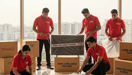 Household Relocation – Movers Packing Fragile Items Carefully