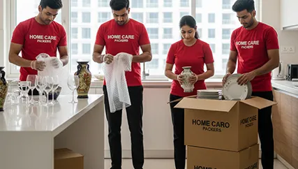 Movers Carefully Packing Household Items