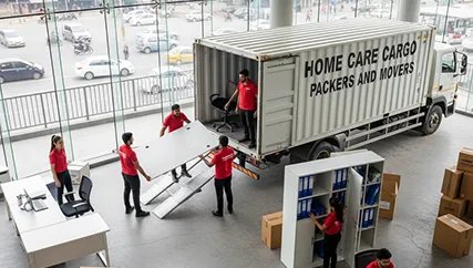 Office Relocation – Movers Unloading Furniture