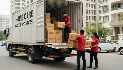 Movers loading well-organized boxes into a moving truck for a smooth relocation