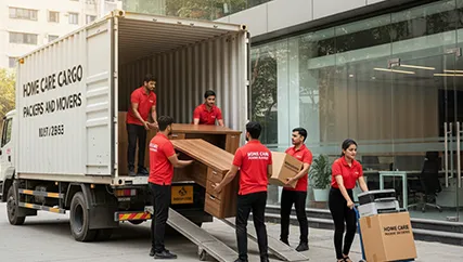 Packers unloading office furniture during an office relocation in DLF Phase 1, Gurugram