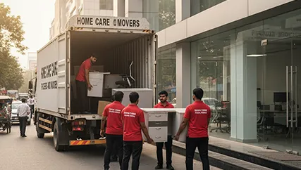 Packers unloading office furniture in DLF Phase 3, Gurugram