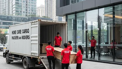 Packers unloading office furniture in DLF Phase 5, Gurugram