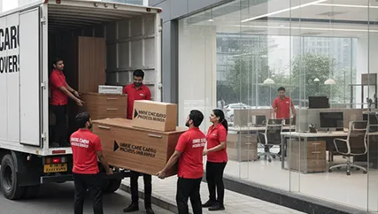 Packers unloading furniture in Dwarka Expressway, Gurugram for office relocation