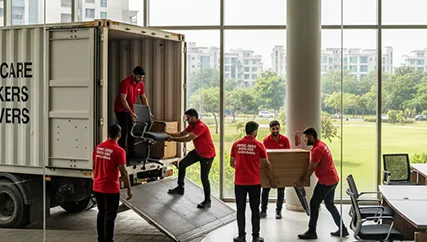 Movers unloading furniture in Golf Course Road, Gurugram