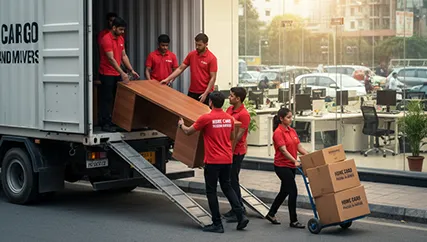 Packers unloading office furniture in MG Road, Gurugram