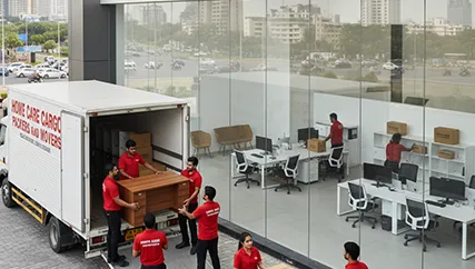 Packers unloading office furniture in New Gurgaon, Gurugram