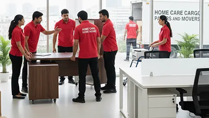 Movers unloading furniture into an office space