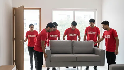 Packers unloading office furniture in Palam Vihar, Gurugram