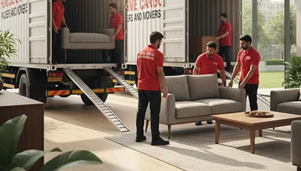 Movers unloading furniture into a living room