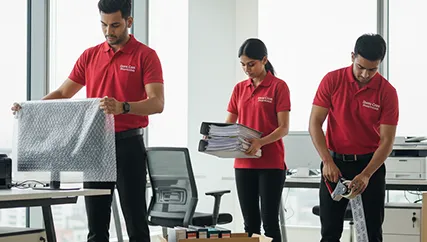Office relocation staff packing office items