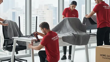 Office relocation with movers handling office furniture and electronics with care in Sector 67