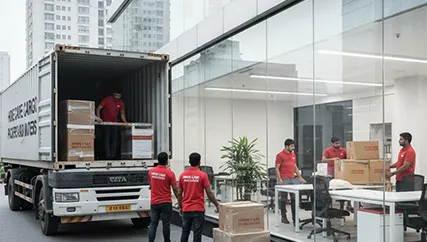 Movers unloading packed office furniture in Sector 8, Gurugram