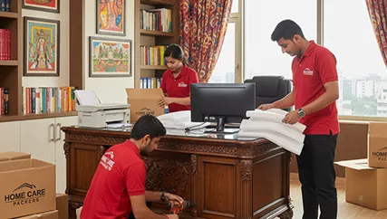 Movers carefully packing office furniture and electronics in Sohna Sector 5, Gurugram